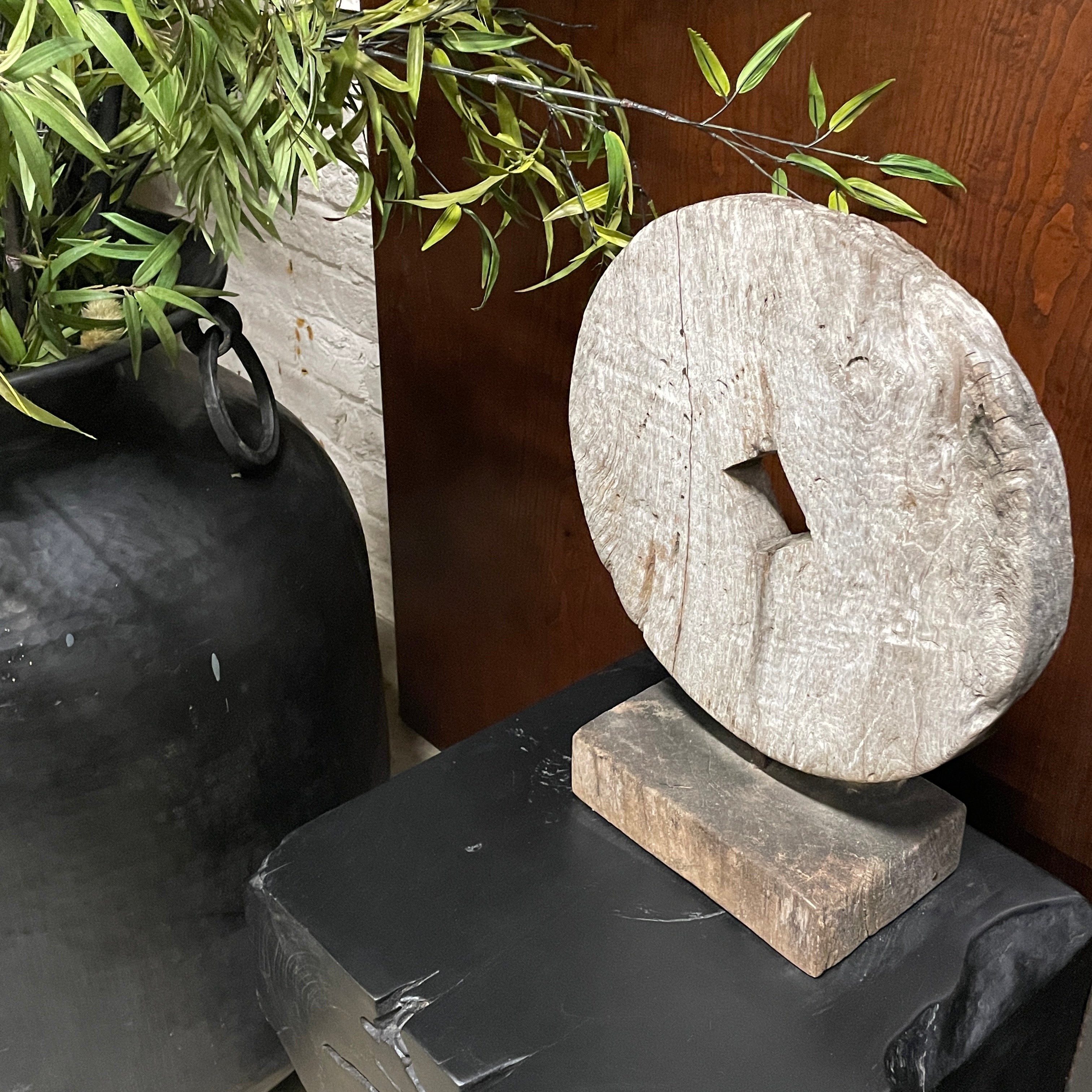 WOODEN WHEEL ON STAND