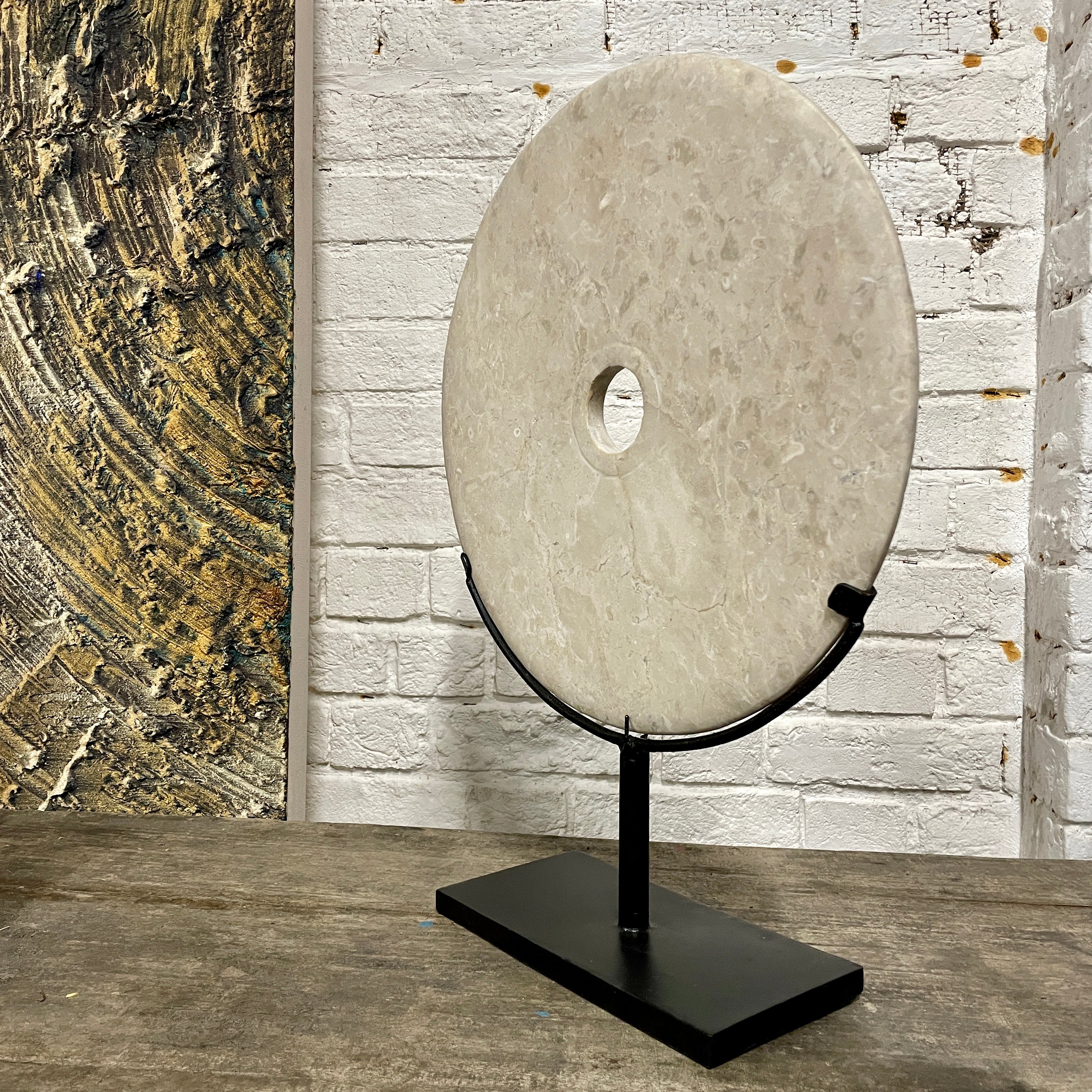 LARGE STONE DISC ON STAND
